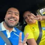 Motoristas de app vivem correria na estreia da Copa
